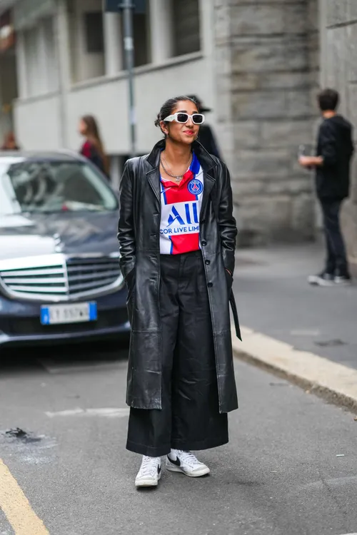 guest-wears-white-sunglasses-silver-earrings-a-silver-chain-news-photo-1659543097