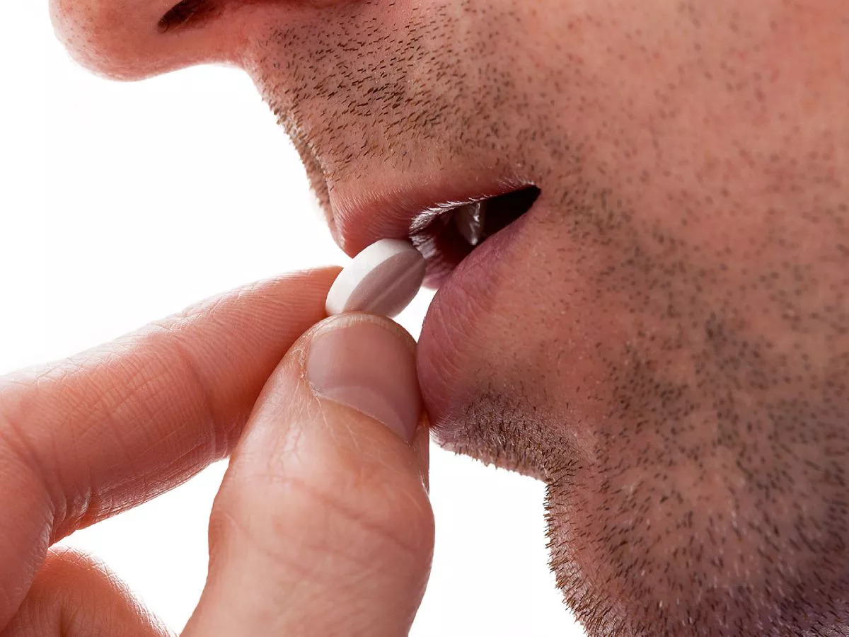 tomar pastilla medicamento