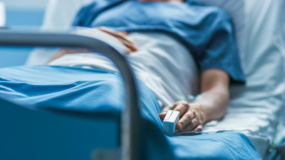 hospital-patient-bed-sick-ill-stock-getty